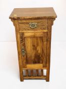 A hardwood single door bedside cupboard, width 39 cm.