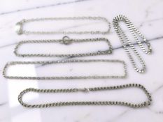 Five various necklaces including curb link and belcher examples, all stamped 925.