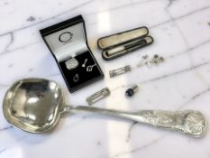A group of silver or white metal jewellery including two Charles Rennie Mackintosh design brooches,