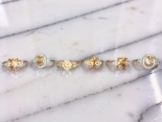 Six Morganite dress rings