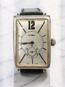 A gent's silver wristwatch signed Cyma,