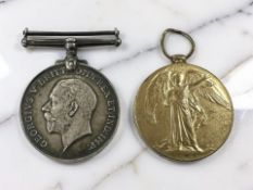 A WWI pair comprising British War Medal and Victory Medal, named to 18-1287 Pte. E.