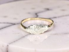 An 18ct yellow gold ring set with a small diamond, size L CONDITION REPORT: 1,