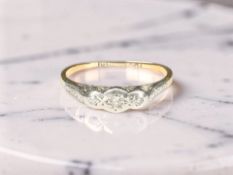 An 18ct yellow gold three-stone diamond ring, size L CONDITION REPORT: 1.