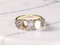 A 9ct yellow gold opal and amethyst dress ring,