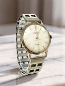 A gentleman's Accurist wristwatch with 9ct gold case, on gold plated expansion strap,
