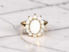 A 9ct yellow gold opal cluster ring, size N CONDITION REPORT: 2.