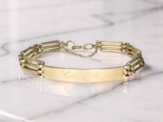 A 9ct yellow gold identity bracelet CONDITION REPORT: 6.