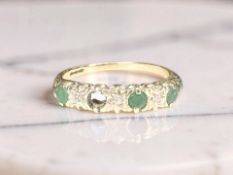 A 9ct yellow gold synthetic stone dress ring, size M CONDITION REPORT: 1.