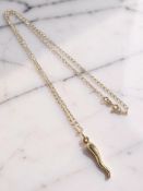 A 9ct yellow gold necklace, with swirl drop pendant CONDITION REPORT: 3.