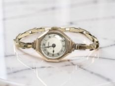 A lady's Audax 9ct yellow gold wristwatch on 9ct gold expansion bracelet,