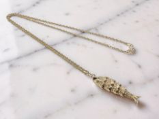 A 9ct yellow gold necklace with reticulated fish pendant CONDITION REPORT: gross 9.