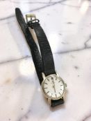 A lady's Omega wristwatch with 9ct yellow gold back,