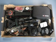 A Canon Powershot SX170 IS camera body, together with other photography accessories,