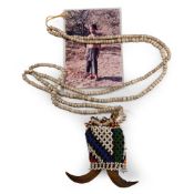 Zulu Woman's Beaded 'Goat Horn' Wedding Necklace and Photograph of an Unknown Zulu, a Descendant of