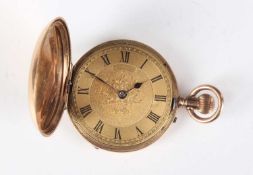 A Swiss 14K gold hunting cased keyless wind lady's fob watch with unsigned jewelled lever