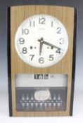 A Seiko Time-Dater wall clock, circa 1960s, with thirty day movement, the signed 8-inch circular