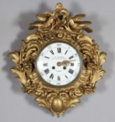 A late 19th century giltwood and gesso cased wall clock with eight day movement striking on a
