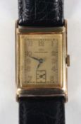 An IWC (International Watch Co) 14K gold rectangular cased gentleman's wristwatch, the signed and