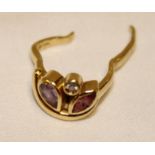 An 18ct gold dress ring set a diamond chip and amethyst (damaged) (3.