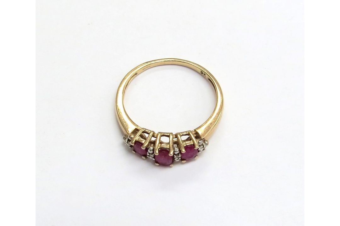 A 9ct gold ruby and diamond ring. Size O/P, 1.8g - Image 2 of 2