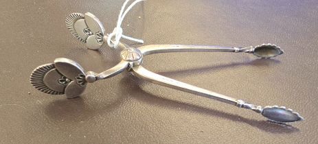 A pair of Georg Jensen Danish silver sugar nips in cactus pattern, approx. weight 23gms. GC