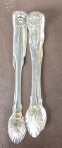 A pair of Scottish silver sugar tongs, fiddle and shell pattern, Hm Edinburgh 1823, makers mark W&