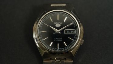 Seiko 5 Automatic, reference 7S26-01T0 Steel case with display back, Seiko signed bracelet.
