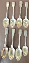 Six Victorian and 1 Georgian silver desert spoons and a presentation silver teaspoon, HM Dublin