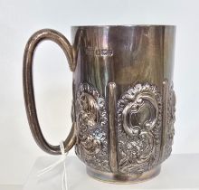 A Victorian silver Christening mug, with heavy repousse panel decoration, HM Sheffield 1895, approx.