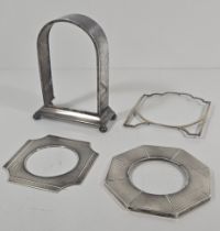 Four pieces of scrap silver, including small clock case. Total weight 153gms.