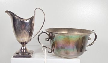 A silver two handled porringer inscribed and dated 1933, Hm Chester 1930; also a small Georgian