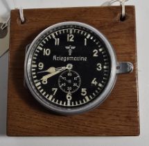 A scarce Third Reich Kreigsmarine Radio Room 8-Day Clock by Junghans, the dial bearing Naval eagle