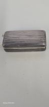 A Georgian rectangular silver Snuff Box, with ribbed decoration overall and gilt interior, by Samuel