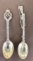 A silver teaspoon the handle in the form of a Lee Metford Rifle, HM London 1903 and a St. Mary's