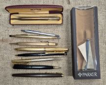 A box of assorted pens and propelling pencils.