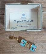 A vintage gold plated and enamel purse watch by Mappin & Webb.