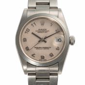 A MIDSIZE STAINLESS STEEL ROLEX OYSTER PERPETUAL DATEJUST BRACELET WATCH CIRCA 1999, REF. 78240 WITH
