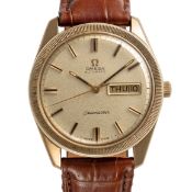 A GENTLEMAN'S SIZE 9CT SOLID GOLD OMEGA SEAMASTER AUTOMATIC DAY DATE WRIST WATCH DATED 1973, REF.