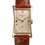 A FINE GENTLEMAN'S SIZE 18K SOLID GOLD PATEK PHILIPPE HOUR GLASS WRIST WATCH DATED 1947, REF. 1593