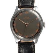 A GENTLEMAN'S MIDSIZE TISSOT ANTIMAGNETIC WRIST WATCH CIRCA 1941, WITH ORIGINAL BLACK & GREY DIAL