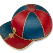 A RARE MUSICAL POCKET WATCH BOX IN A JOCKEY'S HAT FORM CIRCA 1890 The label on the back of the box