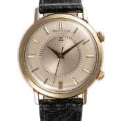 A GENTLEMAN'S LARGE SIZE 10K GOLD FILLED JAEGER LECOULTRE AUTOMATIC MEMOVOX ALARM WRIST WATCH