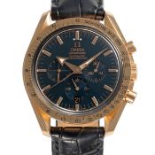 A GENTLEMAN'S SIZE 18K SOLID ROSE GOLD OMEGA SPEEDMASTER AUTOMATIC BROAD ARROW CHRONOMETER
