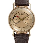 A GENTLEMAN'S SIZE GOLD FILLED LECOULTRE FUTUREMATIC POWER RESERVE WRIST WATCH CIRCA 1950s WITH A