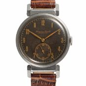A RARE GENTLEMAN'S LARGE SIZE STAINLESS STEEL IWC WRIST WATCH CIRCA 1944, CASE WITH HINGED LUGS &