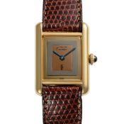 A LADY'S SIZE SOLID SILVER GILT MUST DE CARTIER TANK WRIST WATCH CIRCA 1980s WITH THREE COLOUR