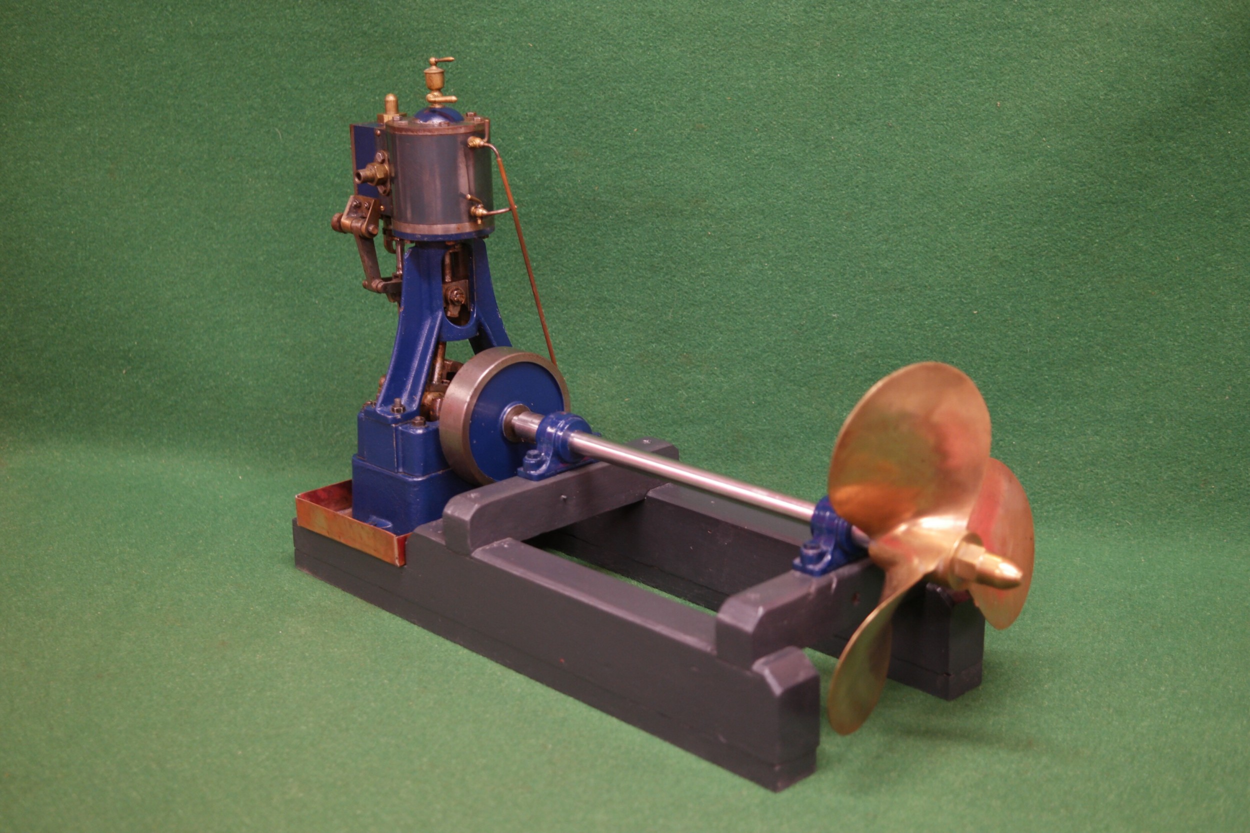 A Stuart 5A single cylinder vertical steam engine with slip eccentric ...