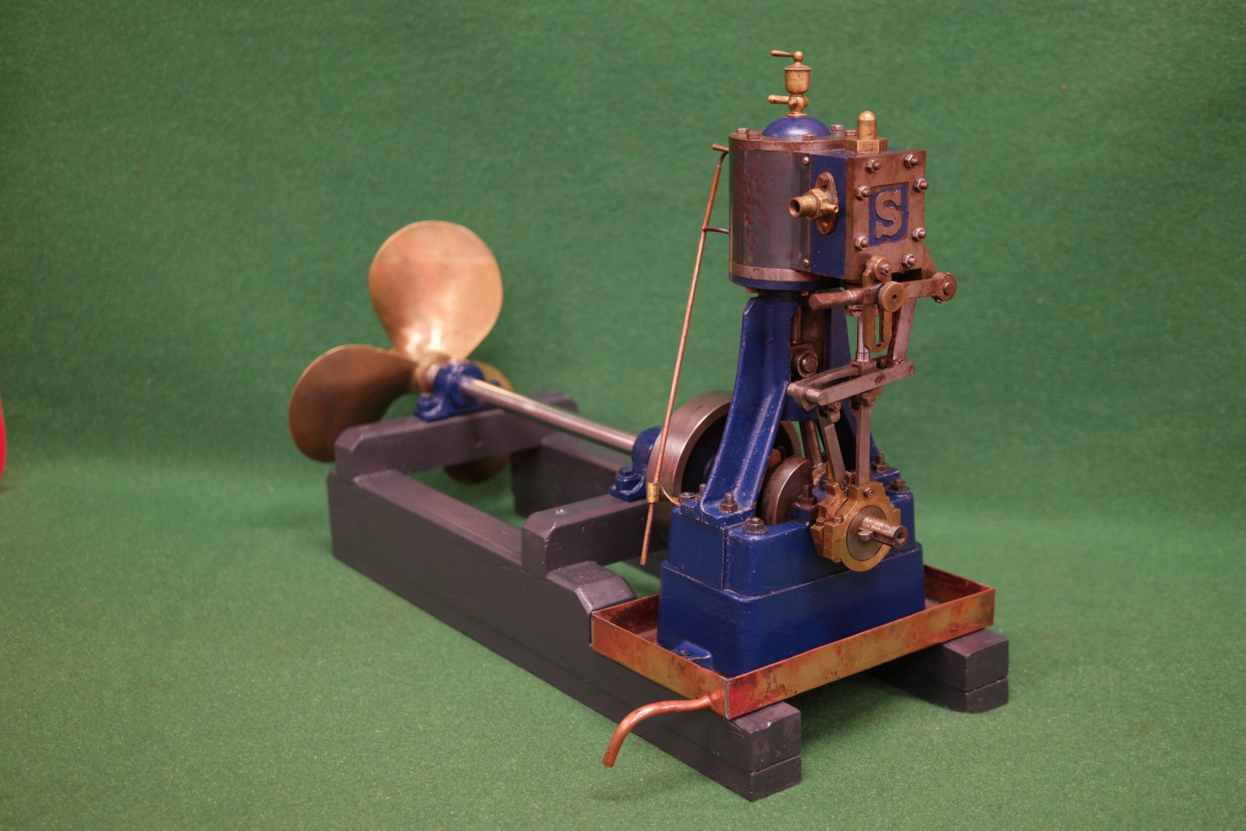 A Stuart 5A single cylinder vertical steam engine with slip eccentric ...