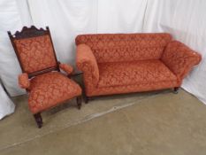 Drop end upholstered settee standing on turned supports with castors - 82cm x 169cm x 79cm tall